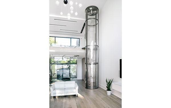 Trend to taller, narrower infill homes brings the residential elevator out of the closet
